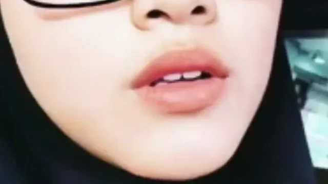 A Woman Wearing A New Pair Of Sunglasses Is Instantly Stunned