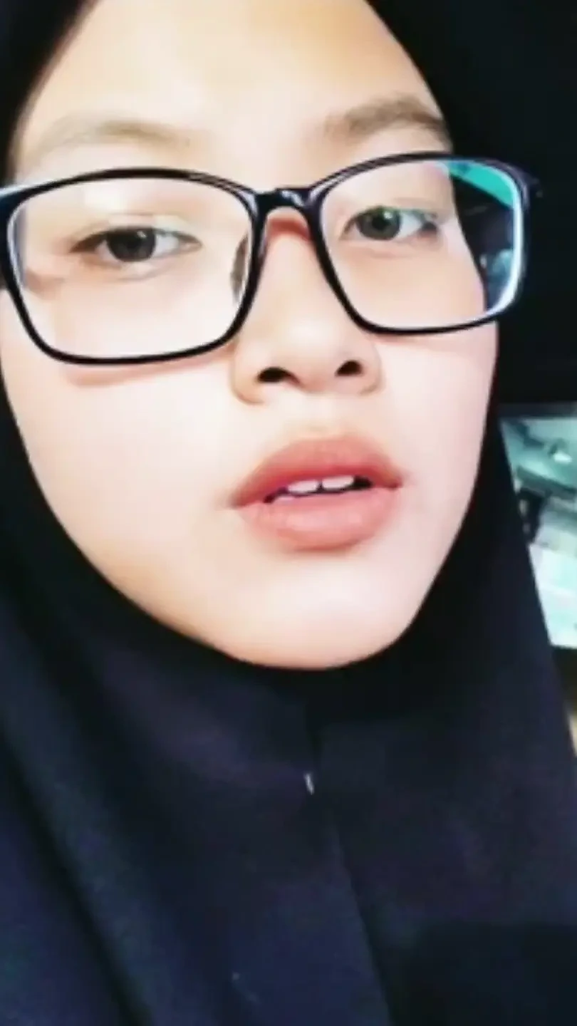 A Woman Wearing A New Pair Of Sunglasses Is Instantly Stunned
